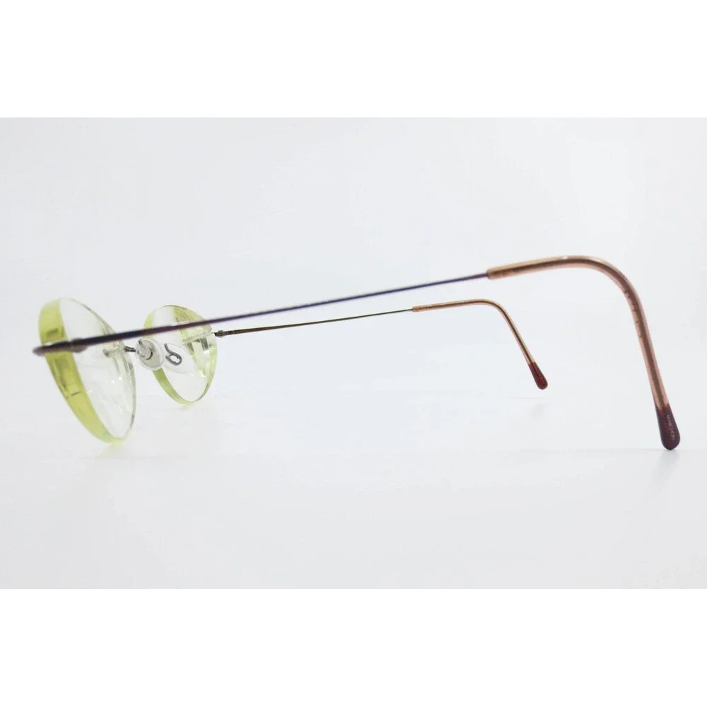 Marchon Airlock 760 Bronze Rimless Oval Eyeglasses Frames 56-19-135 Minimalist